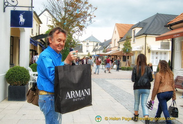 Tony has his bag of Armani purchases